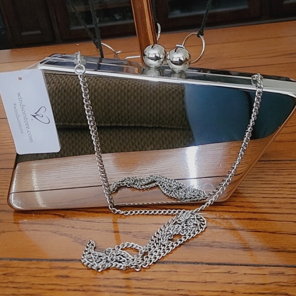 Elegant Silver Clutch with Chain Strap